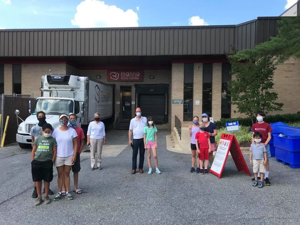 BFM children deliver canned goods to Manna Foods, Bethesda, MD